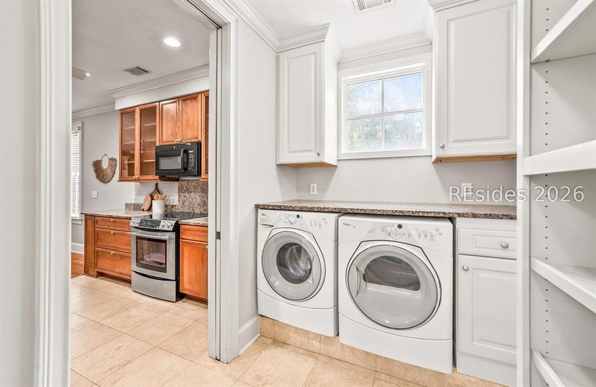 Welcome home to this luxurious lock-and-leave condominium in - photo 17