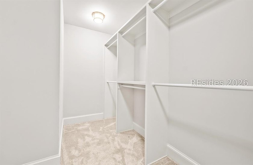 Welcome home to this luxurious lock-and-leave condominium in - photo 23