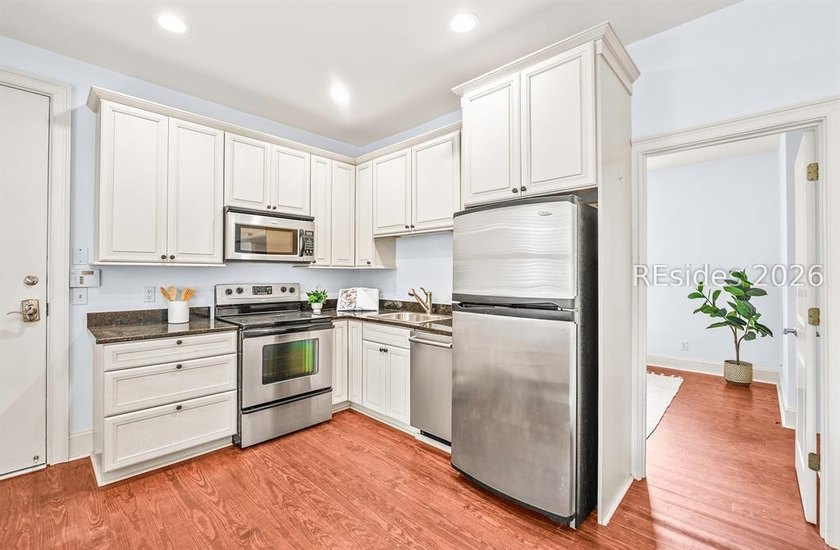 Welcome home to this luxurious lock-and-leave condominium in - photo 34
