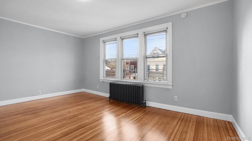 Presenting a beautifully renovated four-level, two-family - photo 8