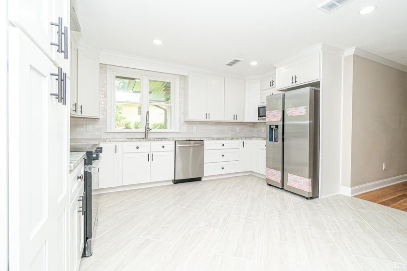 Completely renovated and move-in ready! This beautifully updated - photo 16