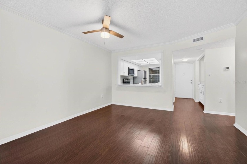 Welcome to easy first-floor living in this bright corner unit - photo 9