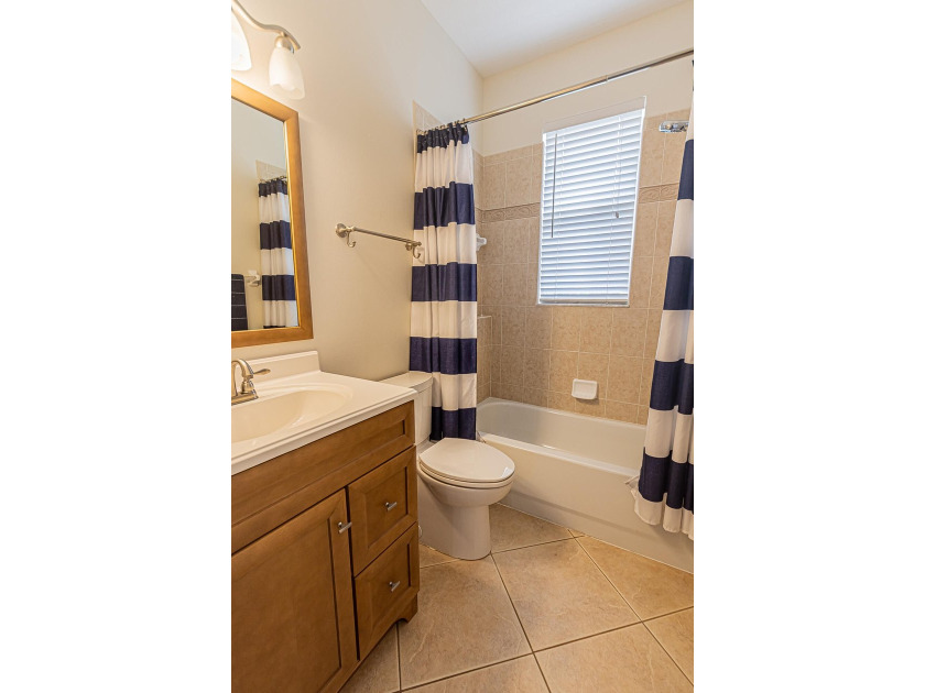 Enjoy stunning lake and pool views from this beautifully - photo 17