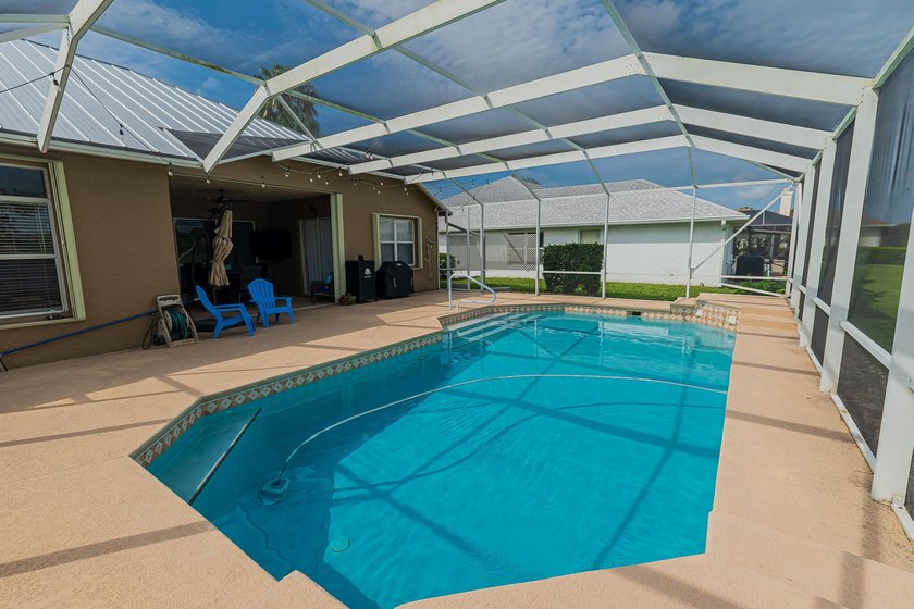 Enjoy stunning lake and pool views from this beautifully - photo 24