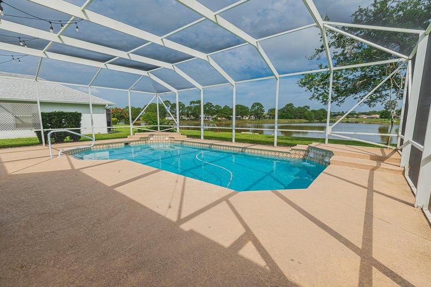 Enjoy stunning lake and pool views from this beautifully - photo 26