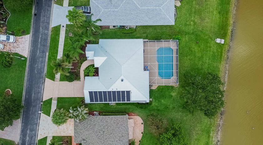 Enjoy stunning lake and pool views from this beautifully - photo 34
