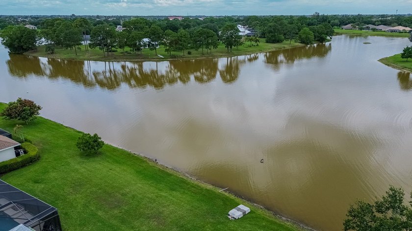Enjoy stunning lake and pool views from this beautifully - photo 35