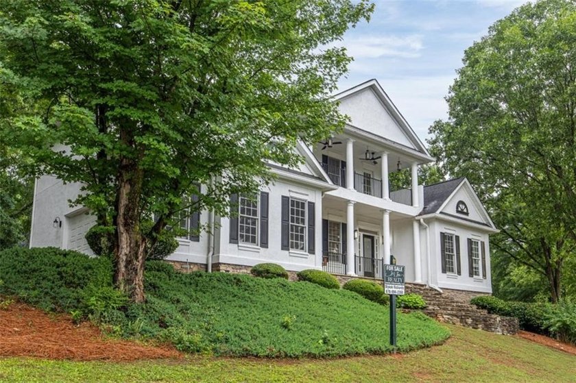 Welcome to 166 Glen Eagle Way, a beautifully remodeled estate - photo 3