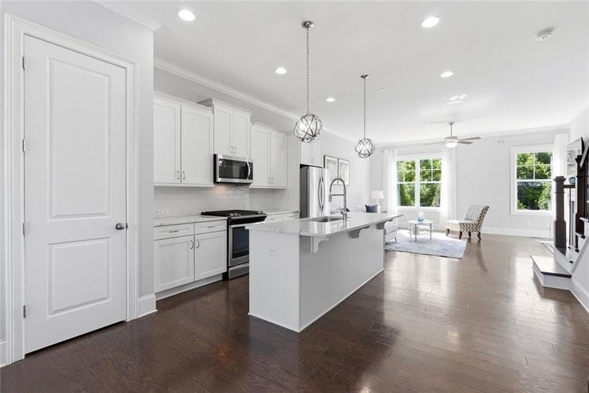 Perfectly positioned in the gated Harlow community, this - photo 12