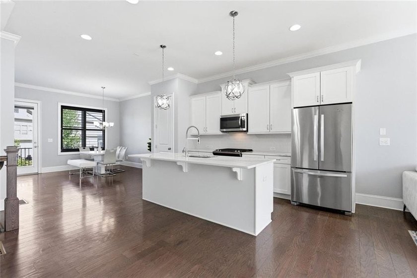 Perfectly positioned in the gated Harlow community, this - photo 14