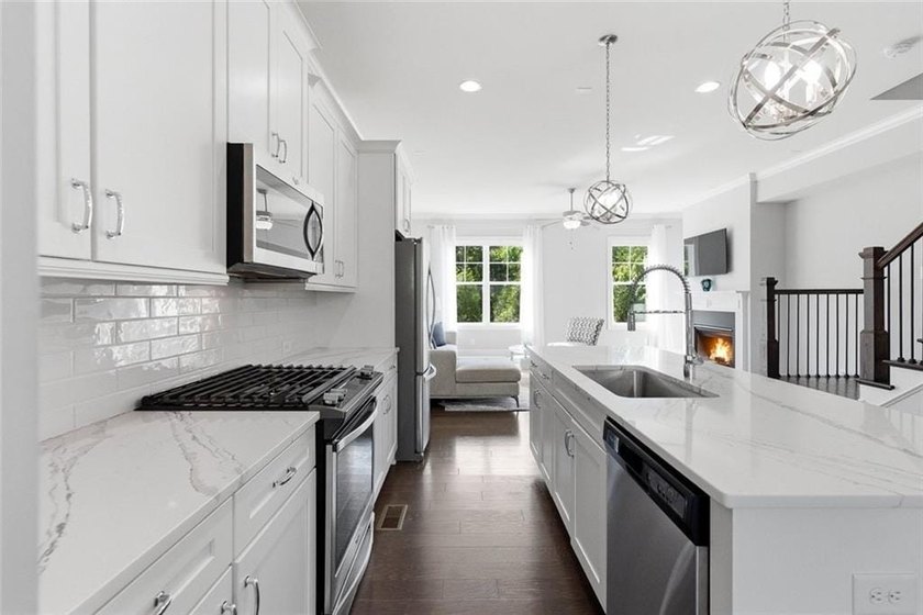 Perfectly positioned in the gated Harlow community, this - photo 18