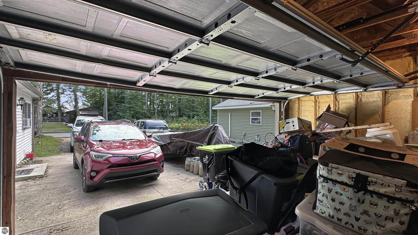 This two-bedroom, one-bath home is located across the street - photo 22