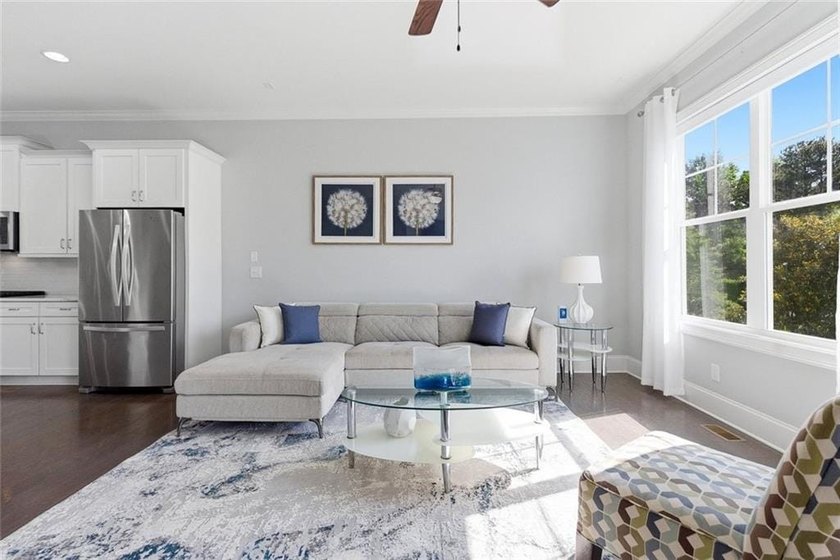 Perfectly positioned in the gated Harlow community, this - photo 23