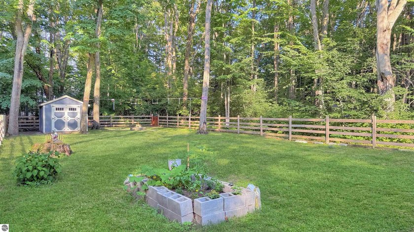 This two-bedroom, one-bath home is located across the street - photo 31