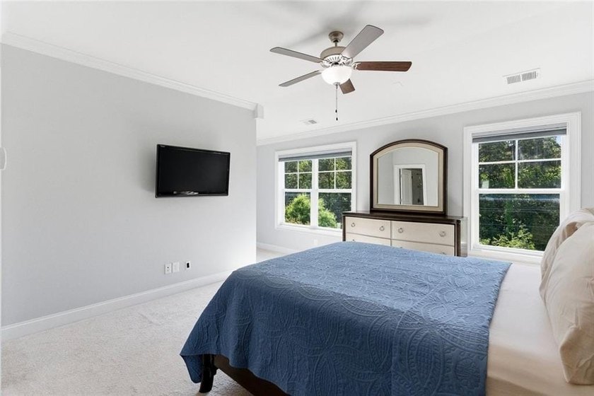 Perfectly positioned in the gated Harlow community, this - photo 33