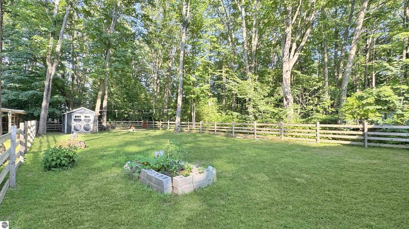 This two-bedroom, one-bath home is located across the street - photo 34