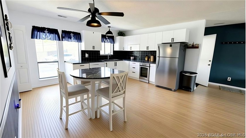 Turnkey lakefront living with strong rental appeal in the heart - photo 4