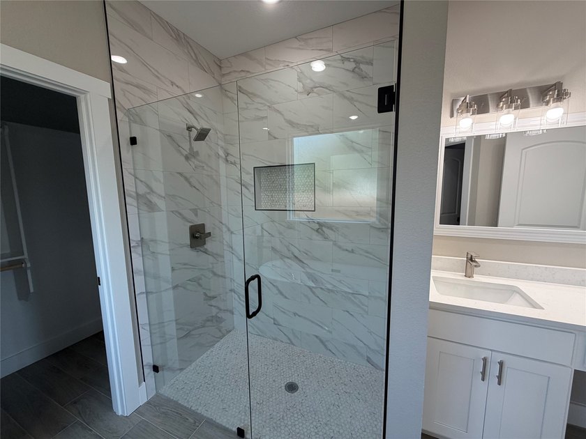 Welcome home to this beautifully designed brand-new 3-bedroom - photo 11
