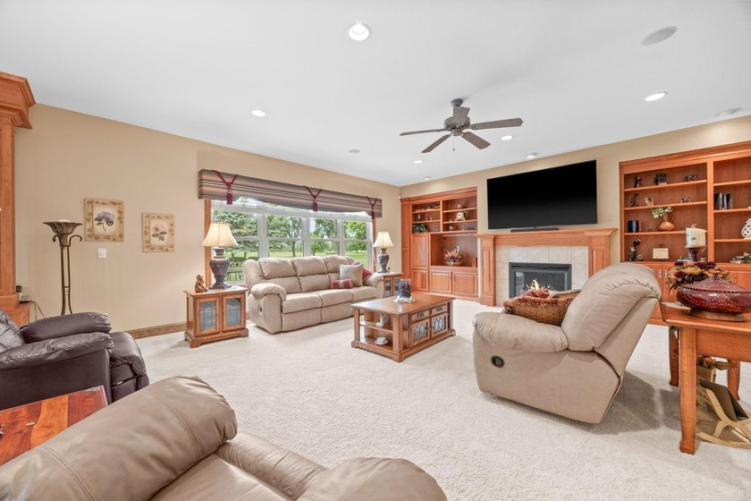 This stately patio home built by Larson Builders overlooks the - photo 6