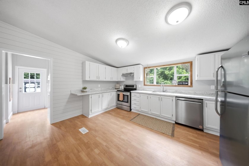 Welcome to 7580 Columbia Highway-where modern updates meet - photo 12