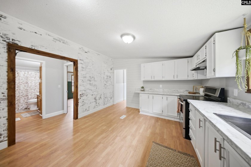 Welcome to 7580 Columbia Highway-where modern updates meet - photo 14
