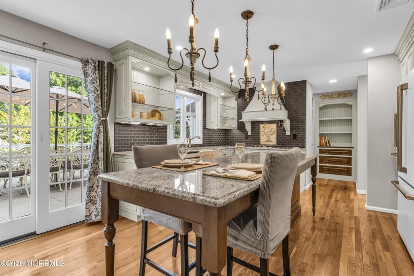 Welcome to a truly exceptional residence nestled on a majestic - photo 18