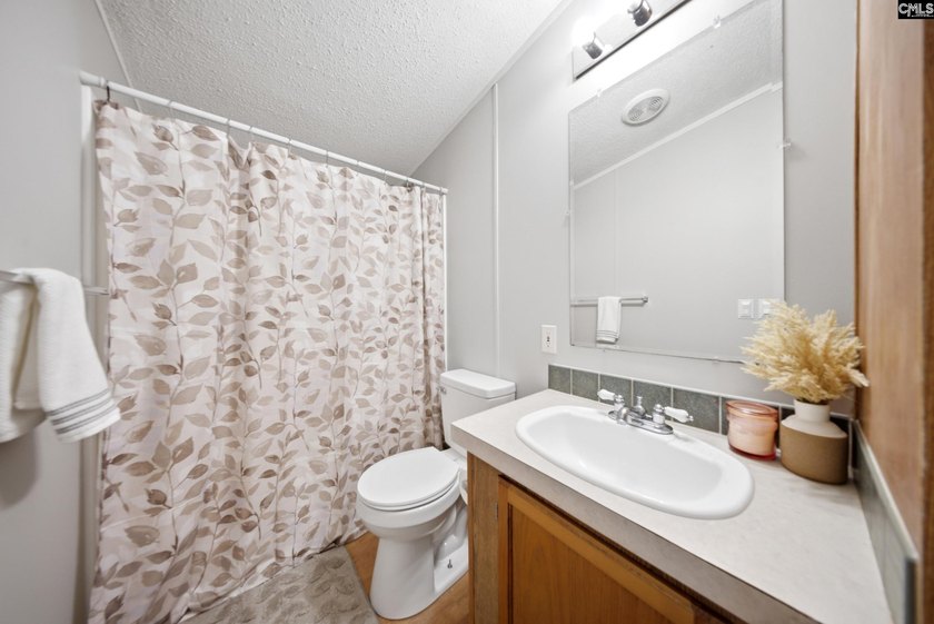 Welcome to 7580 Columbia Highway-where modern updates meet - photo 25