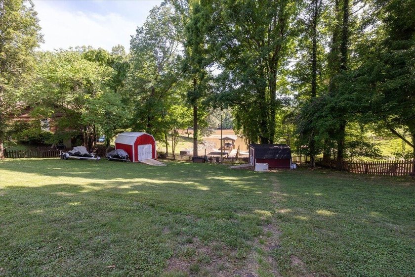 Lakefront living at its finest! Nestled on a beautiful 1-acre - photo 37