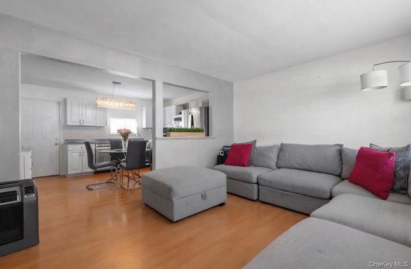 Welcome to this well-maintained Cape-style home set on an - photo 3