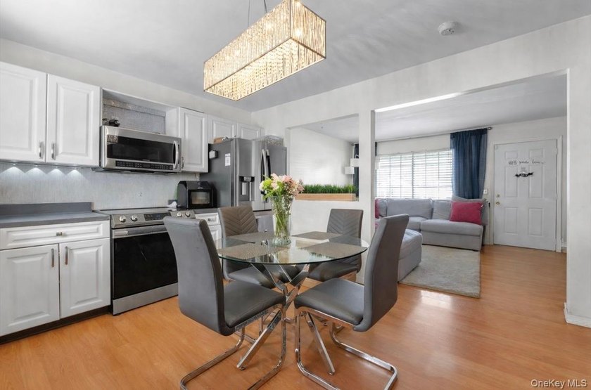 Welcome to this well-maintained Cape-style home set on an - photo 4