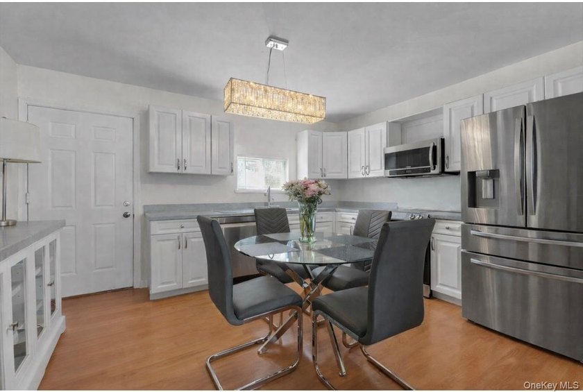 Welcome to this well-maintained Cape-style home set on an - photo 5