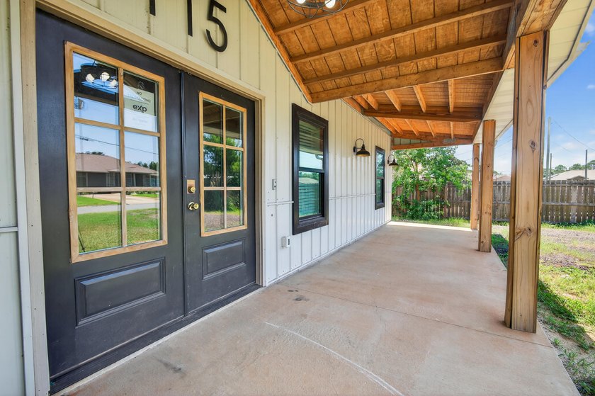 Built in 2023, this modern farmhouse offers a rare blend of - photo 4