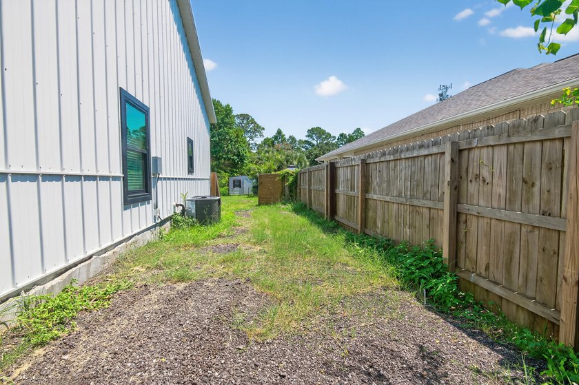 Built in 2023, this modern farmhouse offers a rare blend of - photo 6