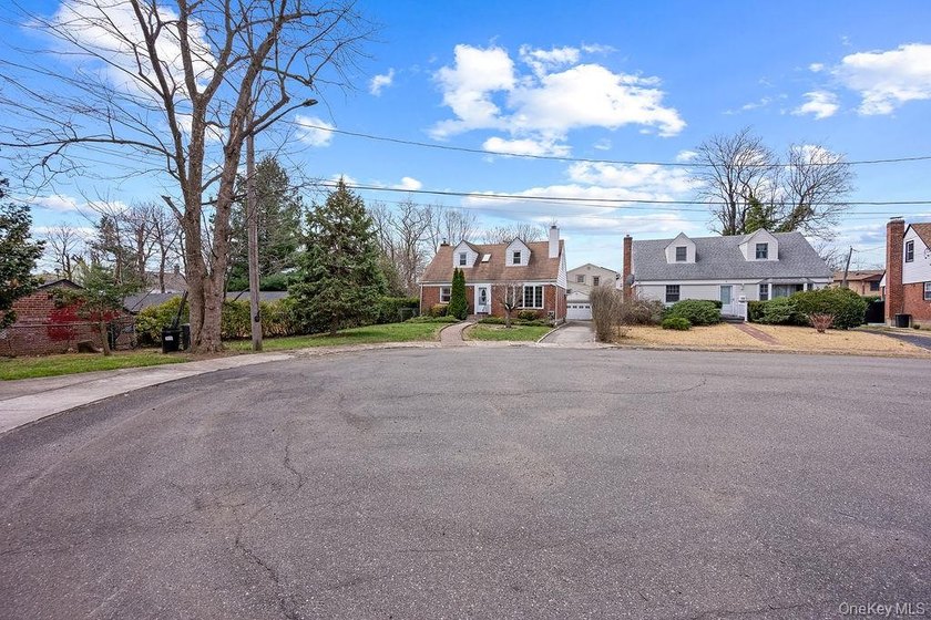 Unbeatable Location! Situated on a quiet cul-de-sac in the - photo 4