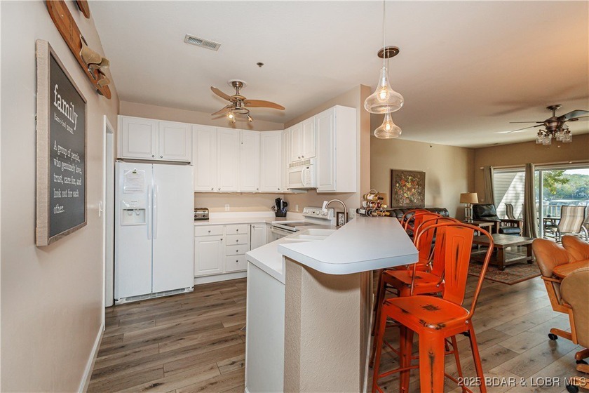 Stunning waterfront view in this FULL PACKAGE updated, fully - photo 2
