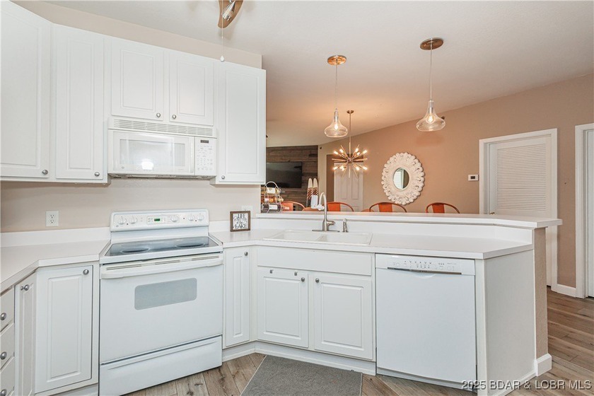 Stunning waterfront view in this FULL PACKAGE updated, fully - photo 3