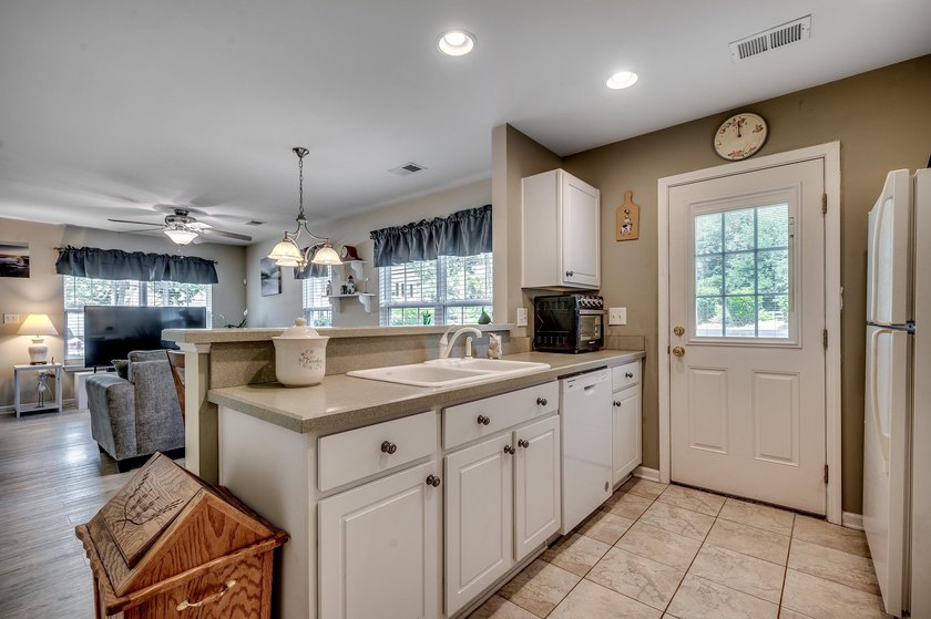 Welcome home to easy coastal living in Merritt Park, one of - photo 11