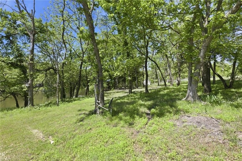 Enjoy camping at this waterfront property in Sugar Valley Lakes! - photo 11