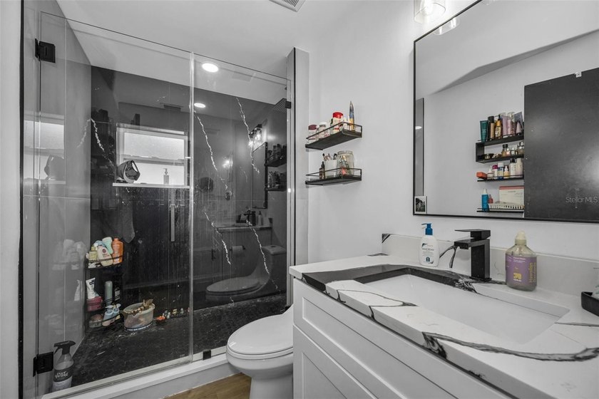 Completely renovated and move-in ready! Situated on two spacious - photo 14