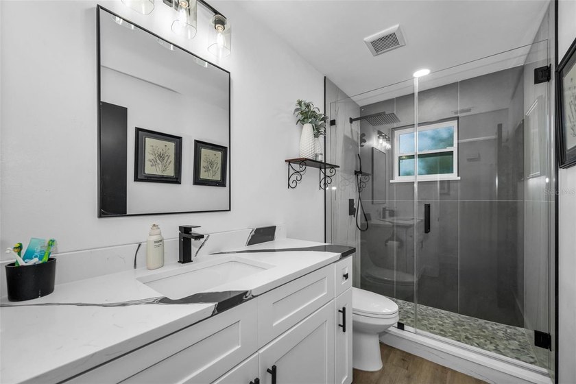 Completely renovated and move-in ready! Situated on two spacious - photo 15