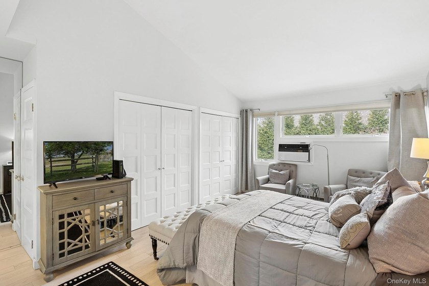 Light-filled and inviting, this upper-level residence at East - photo 8