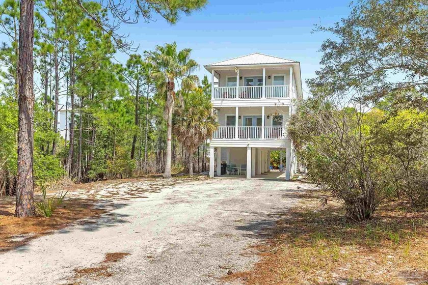 PRICED TO MOVE! DEEDED BEACH ACCESS - HALF-ACRE LOT - STRONG - photo 3