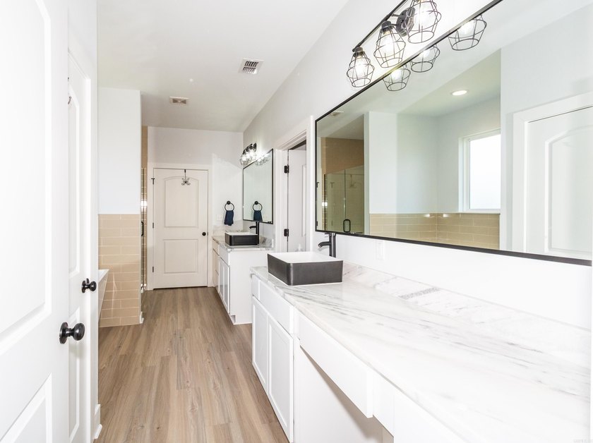 THIS BREATHTAKING HOME IS IN THE NORTHLAKE SUBDIVISION IN - photo 22