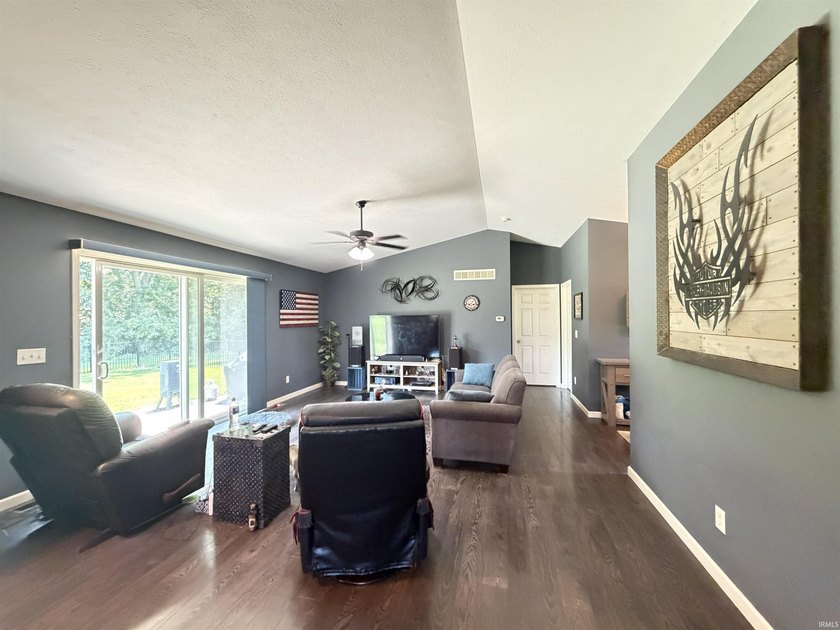 This 2016 ranch enjoys 300 feet of wooded creek frontage on just - photo 11