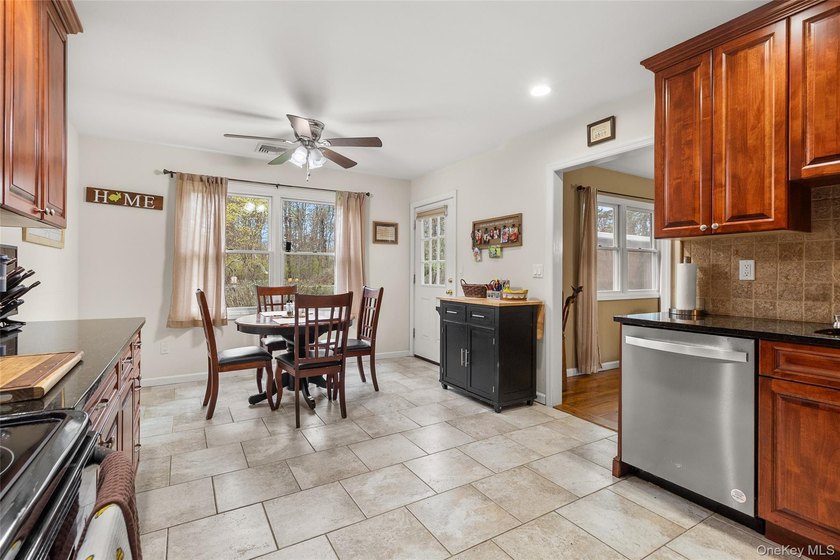 Welcome to this beautiful expanded ranch located in the - photo 7