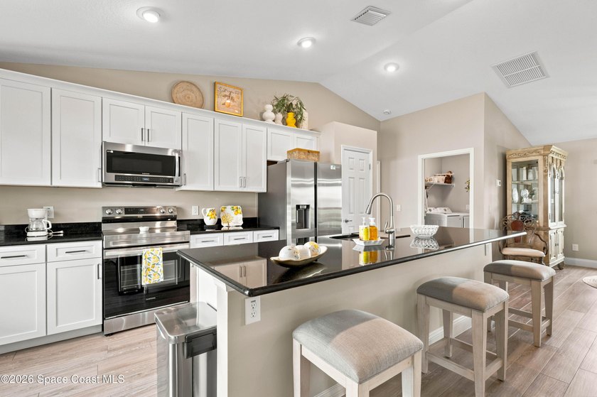 Built in 2023 and meticulously maintained, this stunning home - photo 7
