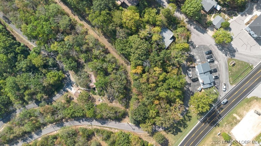 Prime opportunity in Arrowhead Beach! This .95-acre lot offers - photo 10