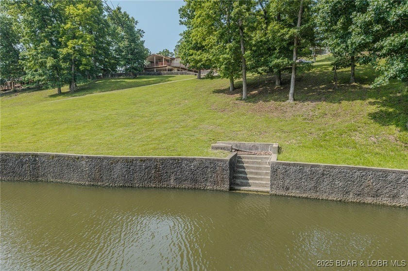 ABSOLUTELY GEORGOUS lake front building lot that is just over - photo 12