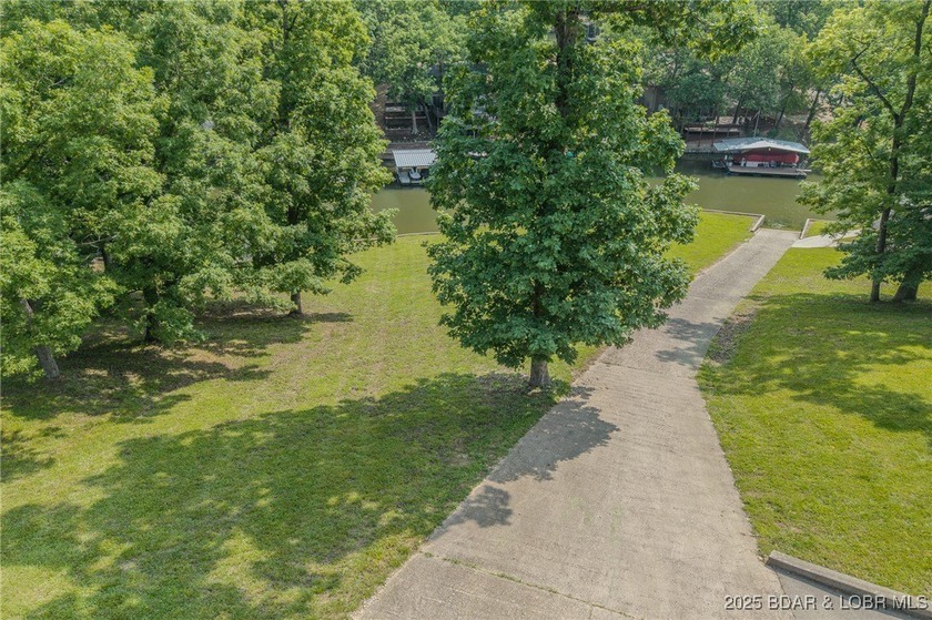 ABSOLUTELY GEORGOUS lake front building lot that is just over - photo 20