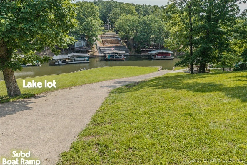 ABSOLUTELY GEORGOUS lake front building lot that is just over - photo 21